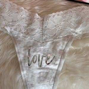 NWT Victoria’s Secret LOVE in silver Lacey thong